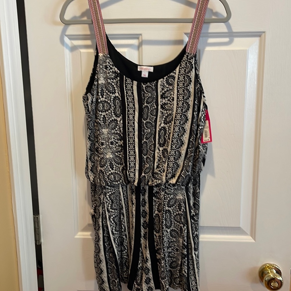 Brand new black white patterned shorts romper.  Size L